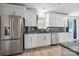 Renovated kitchen with granite counters, stainless steel appliances, and plenty of cabinet space at 3807 Sweetgrass Ln, Charlotte, NC 28226