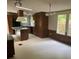 Spacious kitchen with dark cabinetry, an island and a view from the windows at 4006 Hillview Dr, Shelby, NC 28152
