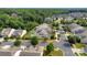 A high angle view of a neighborhood showing houses on tree-lined streets at 417 Brier Knob Dr, Fort Mill, SC 29715