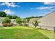 Well-maintained backyard featuring lush lawn and beautiful landscaping at 417 Brier Knob Dr, Fort Mill, SC 29715