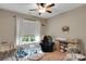 Comfortable Bedroom featuring a ceiling fan, cozy chair, and ample baby gear at 417 Brier Knob Dr, Fort Mill, SC 29715