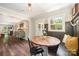 Charming breakfast nook featuring a round wooden table, banquette seating, and natural light from a nearby window at 418 Melody Ln, Shelby, NC 28152