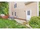 Side view of a home with a fenced backyard, an air conditioner, and a shed at 4333 Poplar Grove Dr, Charlotte, NC 28269