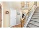 Bright foyer with hardwood floors, staircase, and neutral color palette at 4333 Poplar Grove Dr, Charlotte, NC 28269