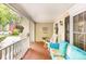 Cozy front porch seating area with an American flag at 4333 Poplar Grove Dr, Charlotte, NC 28269