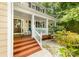 Inviting front porch featuring ample seating, lovely decor, and a warm, welcoming ambiance at 4333 Poplar Grove Dr, Charlotte, NC 28269