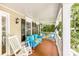 Comfortable seating on the charming front porch at 4333 Poplar Grove Dr, Charlotte, NC 28269