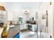Bright kitchen features stainless appliances, white cabinets, granite counters, and natural light at 4333 Poplar Grove Dr, Charlotte, NC 28269