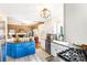 Bright kitchen features stainless appliances, white cabinets, granite counters, and a blue island at 4333 Poplar Grove Dr, Charlotte, NC 28269