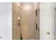 Updated walk-in shower with neutral tile and built-in shelving at 4333 Poplar Grove Dr, Charlotte, NC 28269