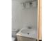 Bathroom featuring white vanity and toilet, with updated lighting at 4417 Grier St, Gastonia, NC 28056