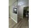 Inviting entryway with decorative wall partition and modern lighting at 4524 Cinderella Rd, Charlotte, NC 28213
