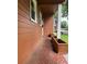 A long, covered porch and window boxes at the front of this home add beauty and curb appeal at 4524 Cinderella Rd, Charlotte, NC 28213
