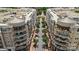 Aerial view of well-planned apartments with private balconies and shade trees, making the neighborhood walkable at 4620 Piedmont Row Dr # 308, Charlotte, NC 28210
