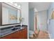 Bathroom with tiled floor, granite countertop, and separate shower stall at 4620 Piedmont Row Dr # 308, Charlotte, NC 28210
