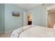 Cozy bedroom with TV, features soft carpeting and comfortable accommodations at 4620 Piedmont Row Dr # 308, Charlotte, NC 28210
