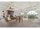Elegant common room with fireplace, TV, and comfortable seating, ideal for socializing and relaxing at 4620 Piedmont Row Dr # 308, Charlotte, NC 28210