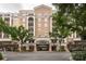 Upscale building exterior with attractive architecture, street access, and convenient parking at 4620 Piedmont Row Dr # 308, Charlotte, NC 28210