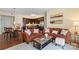 Open-concept living room integrating a modern kitchen, comfortable sofa, and stylish dining area at 4620 Piedmont Row Dr # 308, Charlotte, NC 28210