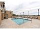 Rooftop pool with lounge chairs, offering a tranquil escape with stunning cityscape views at 4620 Piedmont Row Dr # 308, Charlotte, NC 28210