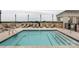 Stylish rooftop pool with comfortable lounge chairs, providing a luxurious experience and city views at 4620 Piedmont Row Dr # 308, Charlotte, NC 28210