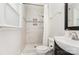 Bathroom featuring tiled walk-in shower and modern fixtures at 4924 Farm Pond Ln, Charlotte, NC 28212