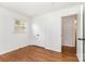 Bedroom with hardwood floors, closet and natural light at 4924 Farm Pond Ln, Charlotte, NC 28212
