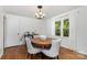 Cozy dining room with a round table, comfortable seating, and charming decor at 4924 Farm Pond Ln, Charlotte, NC 28212