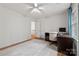 Bedroom featuring a desk and chair with hard wood floors, neutral colored walls, and white ceilings at 5016 Celeste Ct, Charlotte, NC 28270