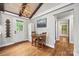 Cozy dining area with wood table, chairs, and modern light fixture, perfect for meals at 605 Cobb St, Lowell, NC 28098