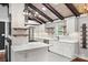 Modern kitchen featuring white cabinets, stainless appliances, and beautiful countertops at 605 Cobb St, Lowell, NC 28098