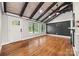 Inviting living room with high ceilings, hardwood floors, and ample natural light at 605 Cobb St, Lowell, NC 28098