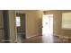 Bright living area with neutral walls, laminate flooring, and natural light at 608 E E St, Newton, NC 28658
