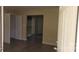 An open-concept living room welcomes with vinyl flooring and fresh paint at 608 E E St, Newton, NC 28658