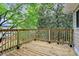 Wooden deck overlooking lush greenery, providing a private outdoor space at 613 N Rhyne St, Gastonia, NC 28054
