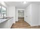 Efficient kitchen offering bright white cabinets and stainless sink at 613 N Rhyne St, Gastonia, NC 28054
