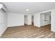 Bright, open living room with modern vinyl flooring, fresh white paint and lots of natural light at 613 N Rhyne St, Gastonia, NC 28054