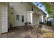 Cozy patio area, perfect for relaxing or entertaining, with convenient access to the garage at 6518 Point Comfort Ln, Charlotte, NC 28226