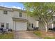 A well-maintained backyard with a patio and a detached garage at 6518 Point Comfort Ln, Charlotte, NC 28226
