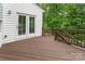 Private back deck, ideal for relaxation, features sturdy railings and views of a lush, green backyard at 6726 Carradale Way, Charlotte, NC 28278