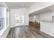 The light filled dining area has wood-look floors and access to the deck via glass doors at 6726 Carradale Way, Charlotte, NC 28278