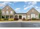 Stunning stone building with beautiful landscaping and a welcoming entrance is for sale at 6726 Carradale Way, Charlotte, NC 28278
