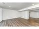 Open-concept living area featuring recessed lighting, durable floors, and neutral walls, perfect for customization at 6726 Carradale Way, Charlotte, NC 28278