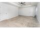 Spacious main bedroom features carpeted floors and plenty of closet space at 6726 Carradale Way, Charlotte, NC 28278