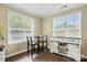 Bright breakfast nook with abundant natural light and a stylish sideboard at 6821 Millingden Ct, Charlotte, NC 28277