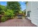 Outdoor wooden deck, ideal for enjoying the fresh air and backyard ambiance at 6821 Millingden Ct, Charlotte, NC 28277