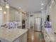 Bright kitchen with stainless steel appliances, hardwood floors, and granite countertops at 736 Creekbridge Dr, Rock Hill, SC 29732