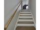 Staircase features neutral walls and a wooden banister at 736 Creekbridge Dr, Rock Hill, SC 29732