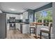 Charming kitchen with stainless steel appliances and an inviting eat-in area at 7830 Sarah Dr, Denver, NC 28037