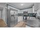 Modern kitchen with stainless steel appliances and ample counter space for cooking at 7830 Sarah Dr, Denver, NC 28037